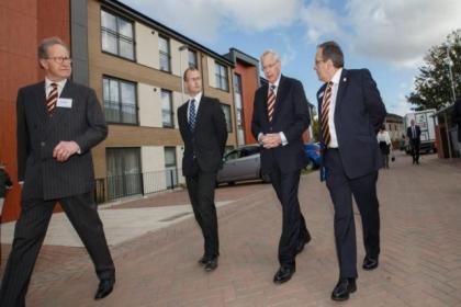 HRH Duke of Gloucester, second from right, officially opened the development of 30 flats and 21 family homes